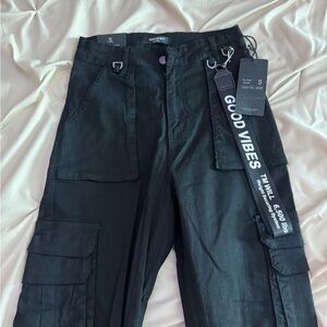 Fashion Nova Black Cargo Pants with Strap Detail